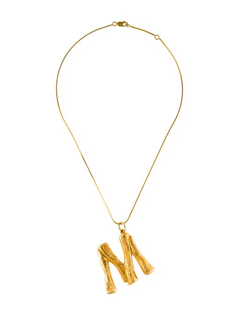 celine alphabet pendant m|Alphabet pendant Celine Gold in Metal .